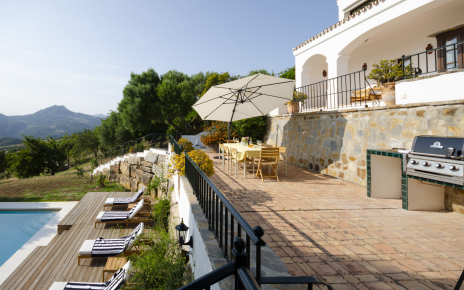 Barbecue terrace with pool area below