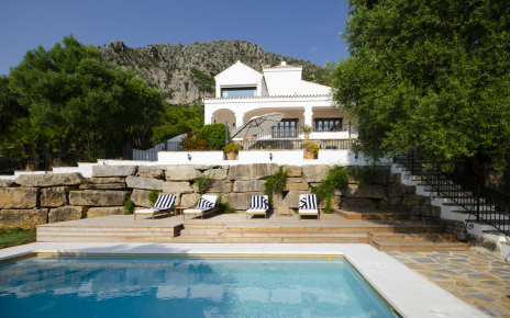 Pool terrace with steps up to other furnished terraces