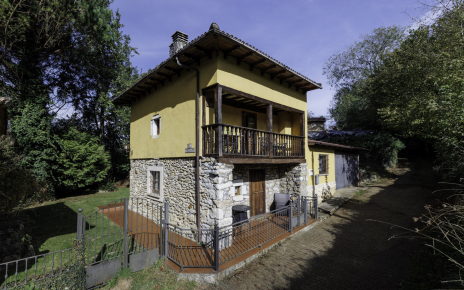 The cottage is arranged over two floors, with a garage annexed
