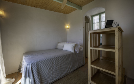 Bedroom with large single bed on third floor