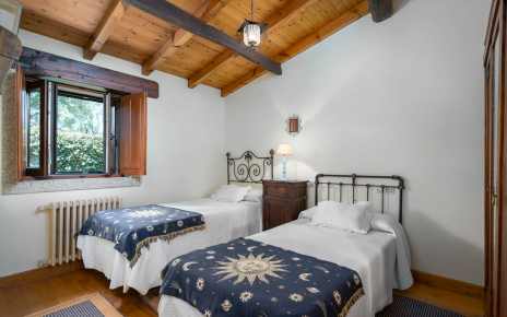 Bedroom 2: Twin beds and en suite shower room