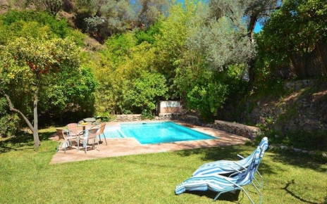 Gated swimming pool with shallow children’s zone